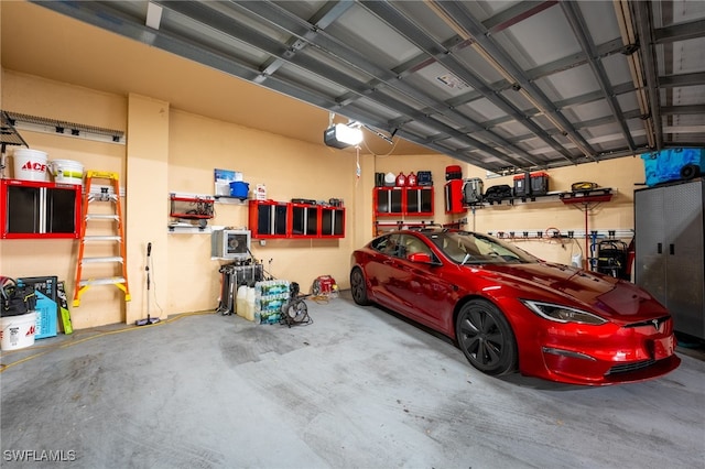 garage featuring a garage door opener