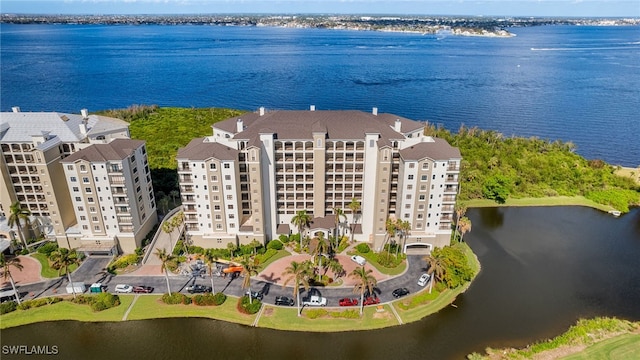 bird's eye view with a water view