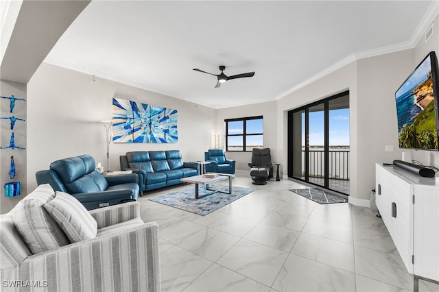 living room with ceiling fan and ornamental molding