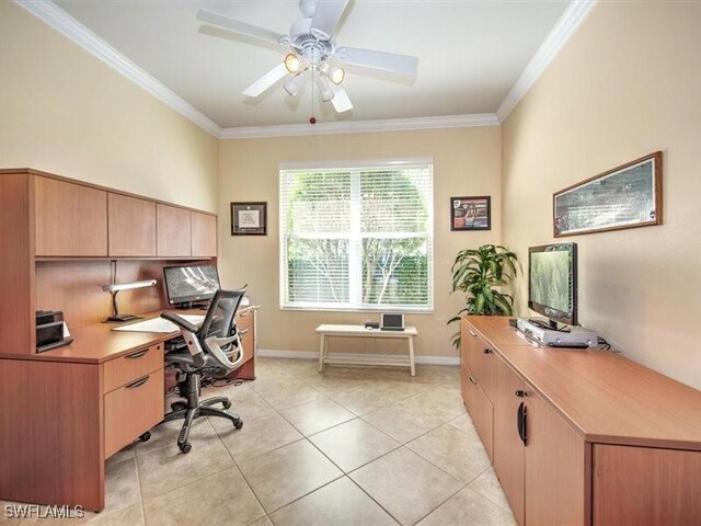 home office featuring ceiling fan, light tile patterned floors, and crown molding