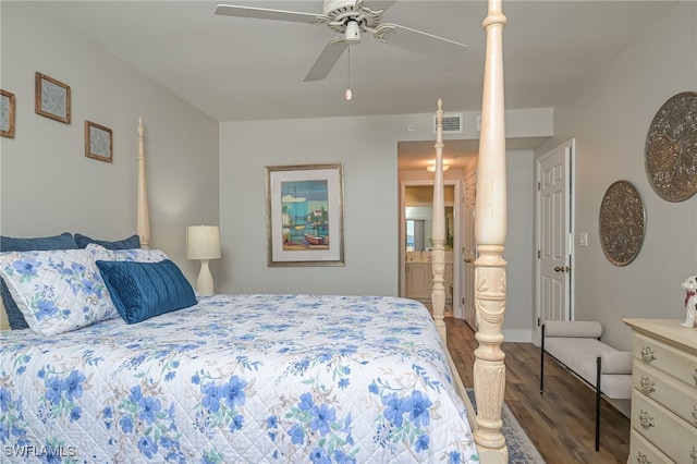 bedroom featuring ceiling fan, dark hardwood / wood-style floors, and ensuite bathroom