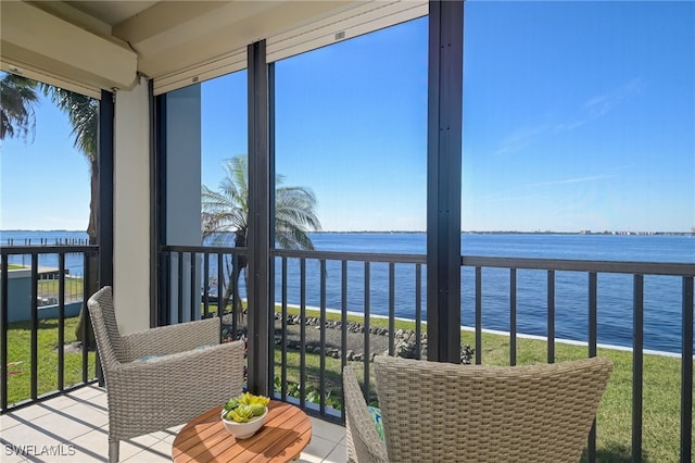 sunroom with a water view