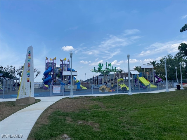 view of jungle gym featuring a yard