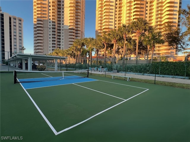 view of tennis court with basketball court