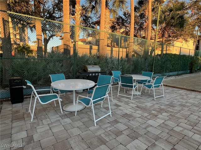 view of patio with a grill