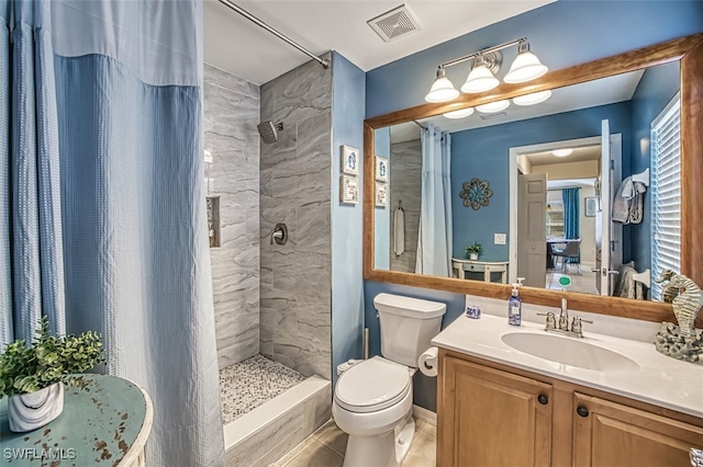 bathroom featuring a shower with curtain, vanity, and toilet