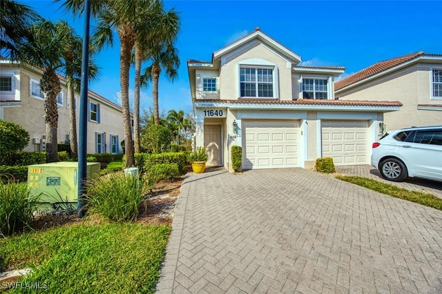 view of front of property featuring a garage