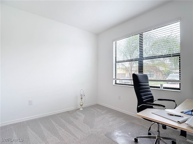 view of carpeted office space