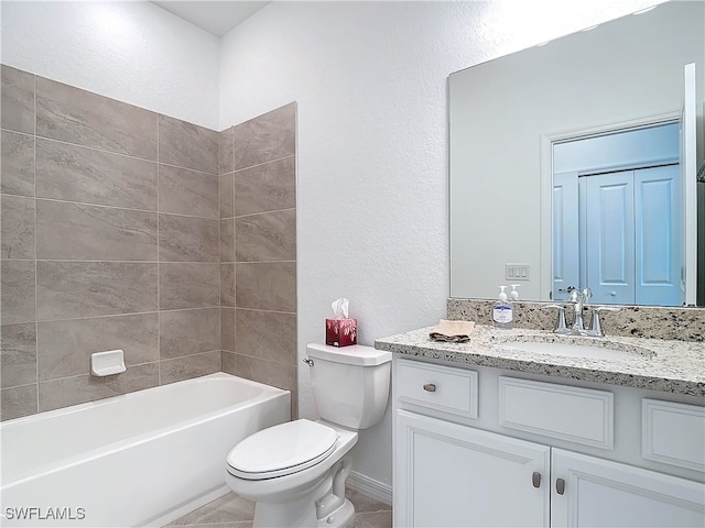 full bathroom featuring vanity, toilet, and tiled shower / bath combo