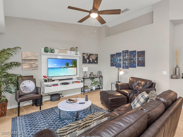 tiled living room with ceiling fan