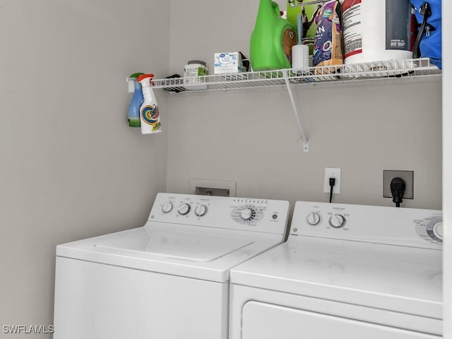 laundry area featuring washer and clothes dryer