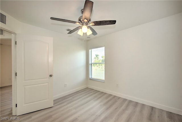 unfurnished bedroom with light hardwood / wood-style flooring and ceiling fan