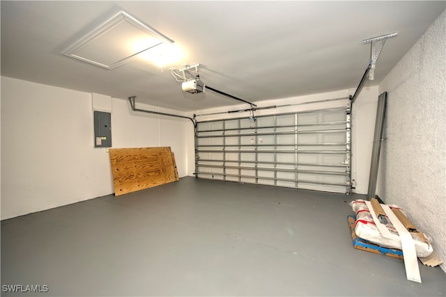 garage featuring electric panel and a garage door opener