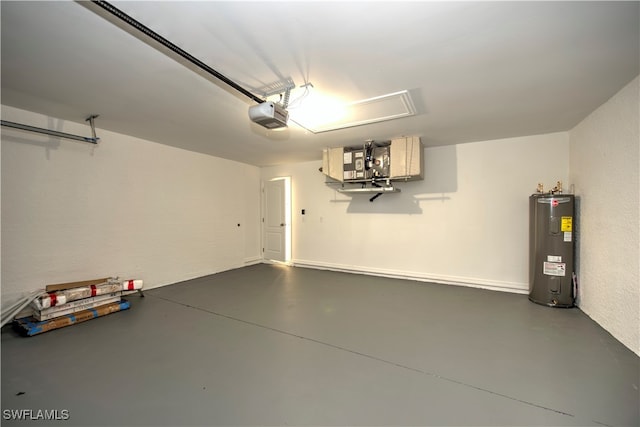 garage featuring electric water heater and a garage door opener