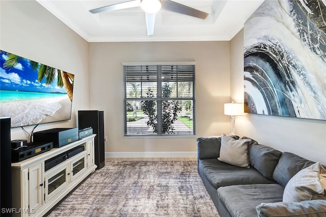 living room featuring ceiling fan and ornamental molding