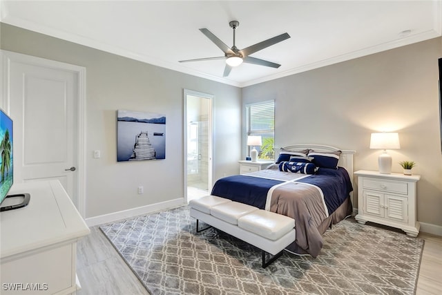 bedroom with connected bathroom, ceiling fan, light hardwood / wood-style flooring, and ornamental molding