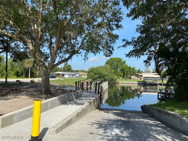 view of dock with a water view