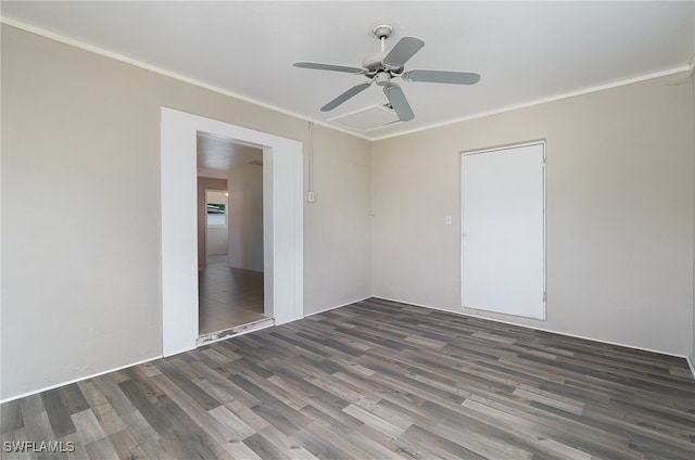 unfurnished room featuring dark hardwood / wood-style floors and ceiling fan