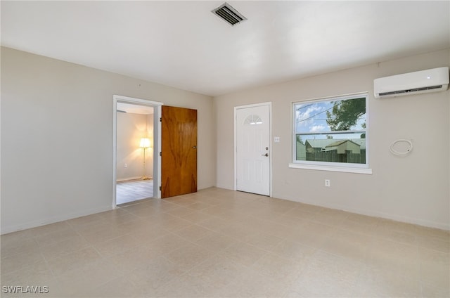 interior space with a wall mounted air conditioner