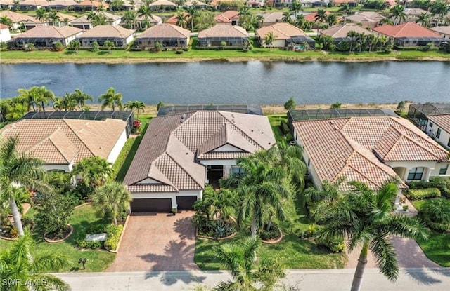 drone / aerial view with a water view