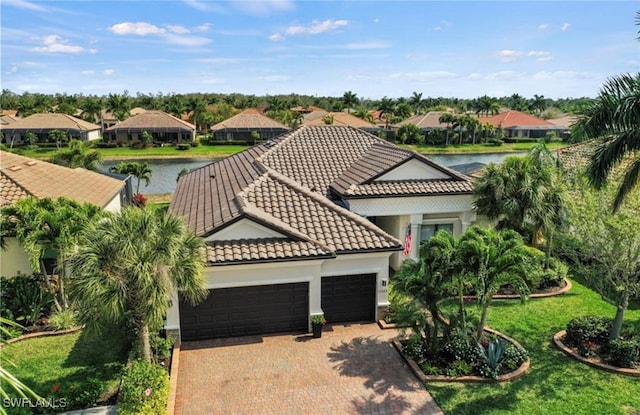 aerial view featuring a water view