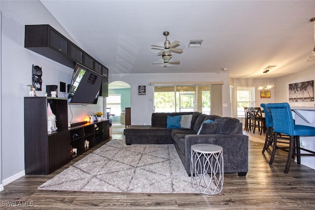 living room featuring hardwood / wood-style floors, a wealth of natural light, and ceiling fan