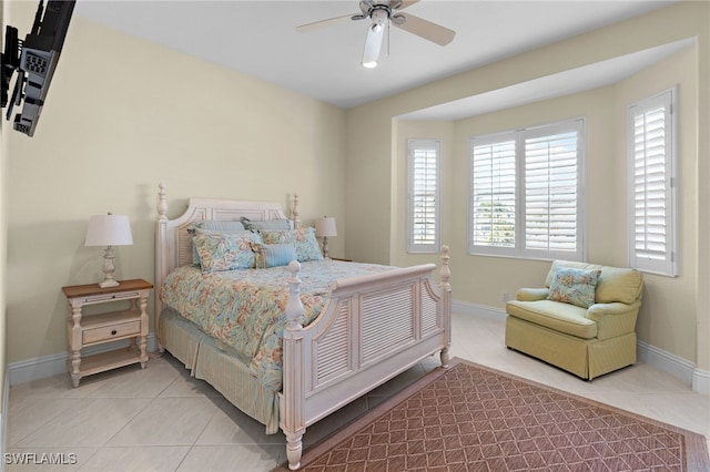 bedroom featuring ceiling fan and light tile patterned floors