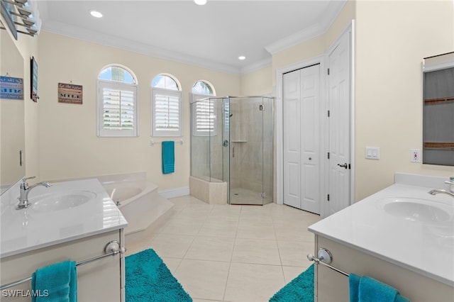 bathroom with tile patterned floors, crown molding, vanity, and independent shower and bath