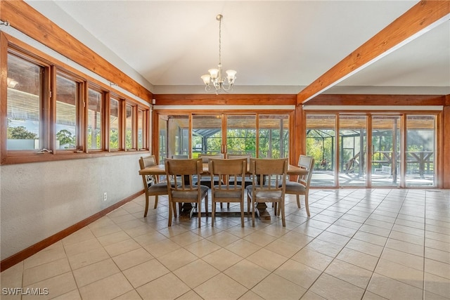 tiled dining space featuring beam ceiling and a chandelier