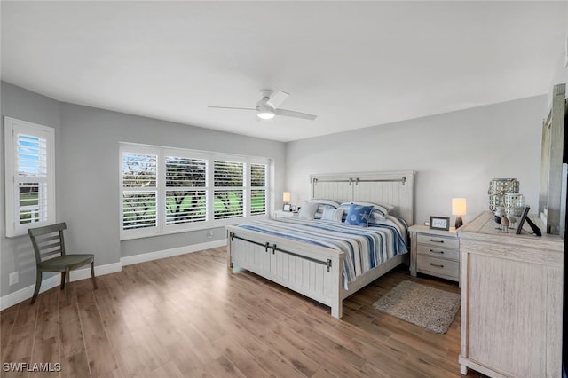 bedroom featuring ceiling fan and light wood-type flooring