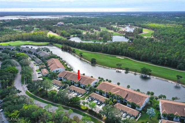 bird's eye view with a water view