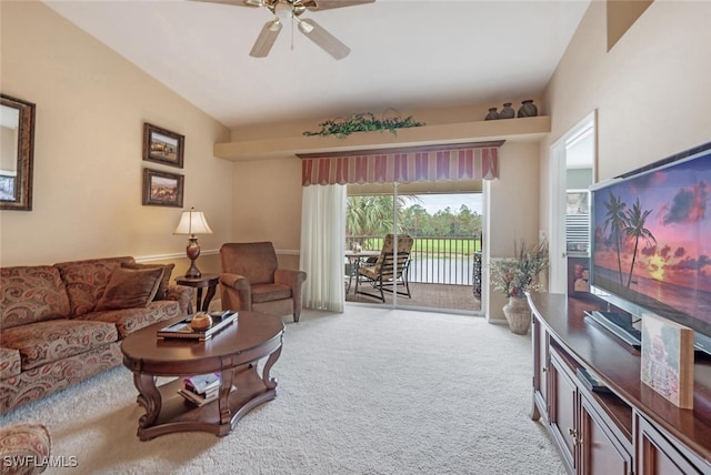 carpeted living room with vaulted ceiling and ceiling fan