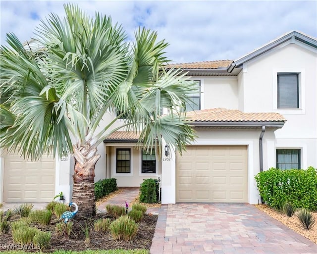 view of front of property with a garage