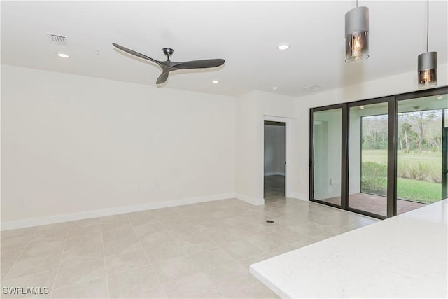 empty room featuring ceiling fan