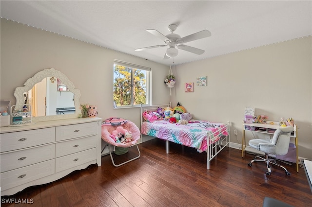 bedroom featuring dark hardwood / wood-style floors and ceiling fan