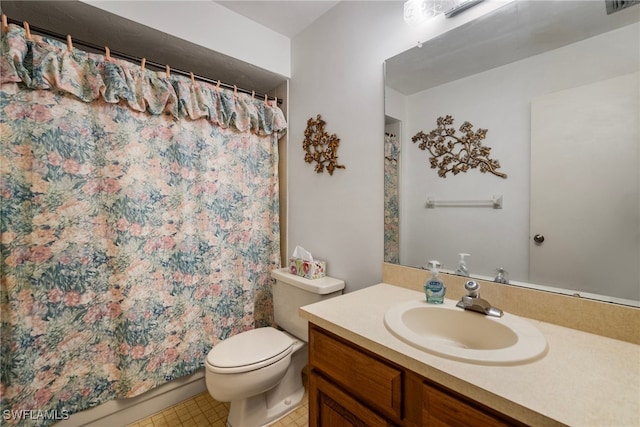 bathroom featuring a shower with shower curtain, tile patterned floors, vanity, and toilet