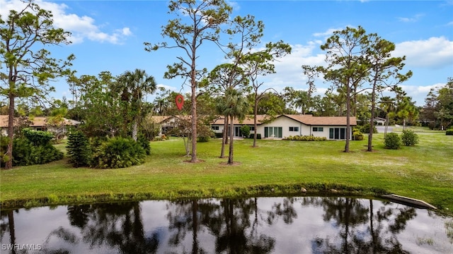 exterior space with a water view