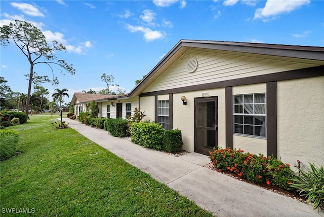 view of front of house with a front yard