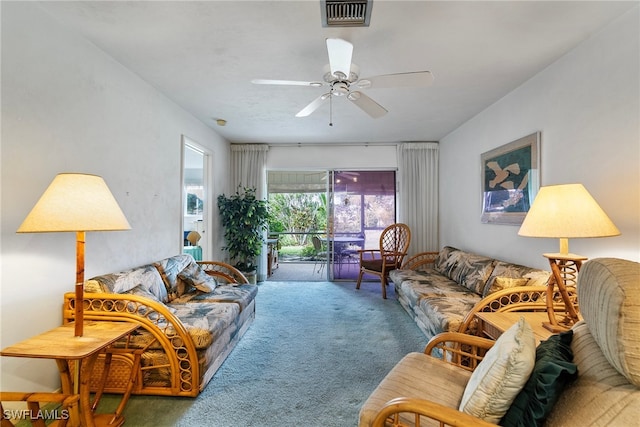 living room with carpet flooring and ceiling fan