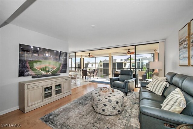 living room with light hardwood / wood-style floors