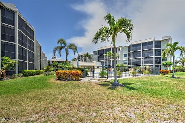 view of property's community featuring a lawn