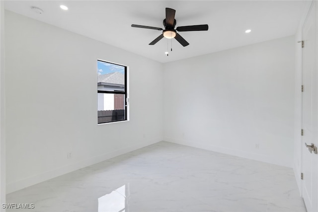 unfurnished room with ceiling fan