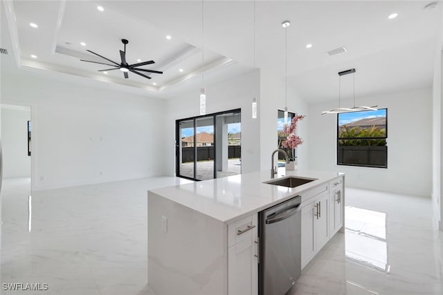 kitchen with ceiling fan, dishwasher, sink, hanging light fixtures, and white cabinets