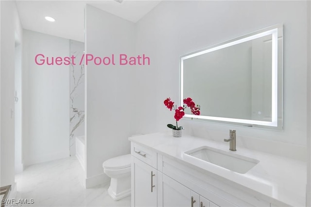 full bathroom with vanity, toilet, and washtub / shower combination