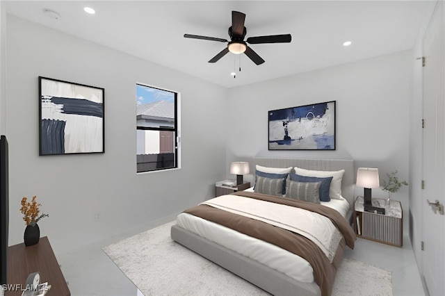 bedroom with ceiling fan and light tile patterned floors