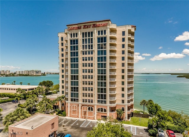 view of building exterior featuring a water view