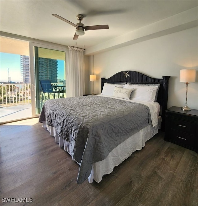 bedroom with access to exterior, ceiling fan, and dark wood-type flooring