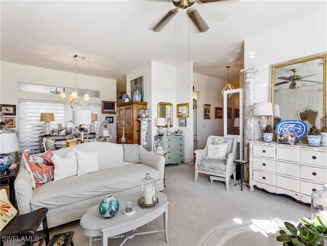 carpeted living room featuring a notable chandelier