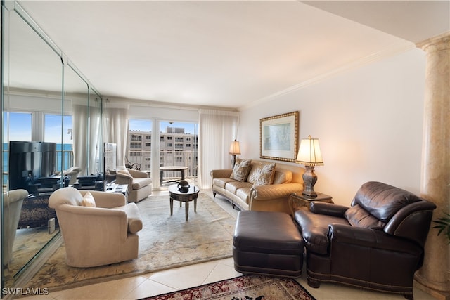 tiled living room with crown molding and a wealth of natural light