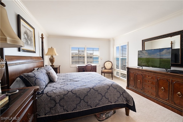 bedroom featuring crown molding and light carpet